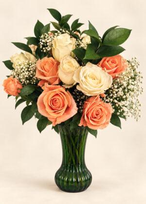 A Bouquet of Love greeting card front featuring an original photograph of peach and ivory roses, baby's breath, and green foliage.