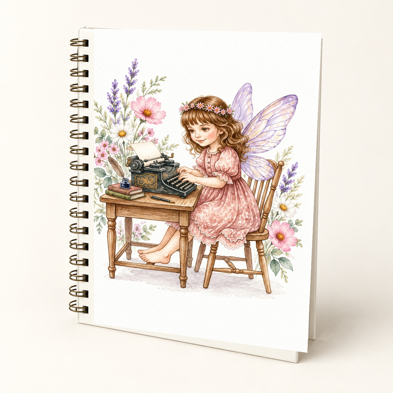 Fairy Writer hard cover Wire-O journal mockup featuring the approved fairy-at-typewriter artwork on an ivory cover.